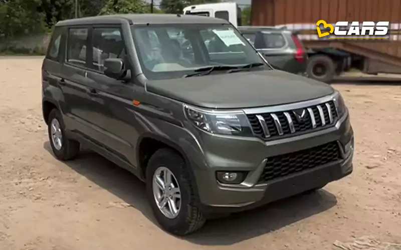 Mahindra bolero neo spied with new twin peaks logo